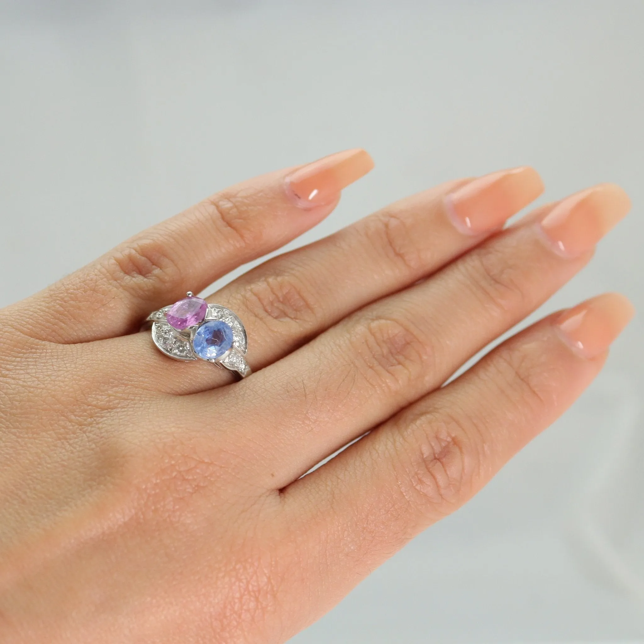 Pink and Blue Sapphire Two Stone Crossover Ring