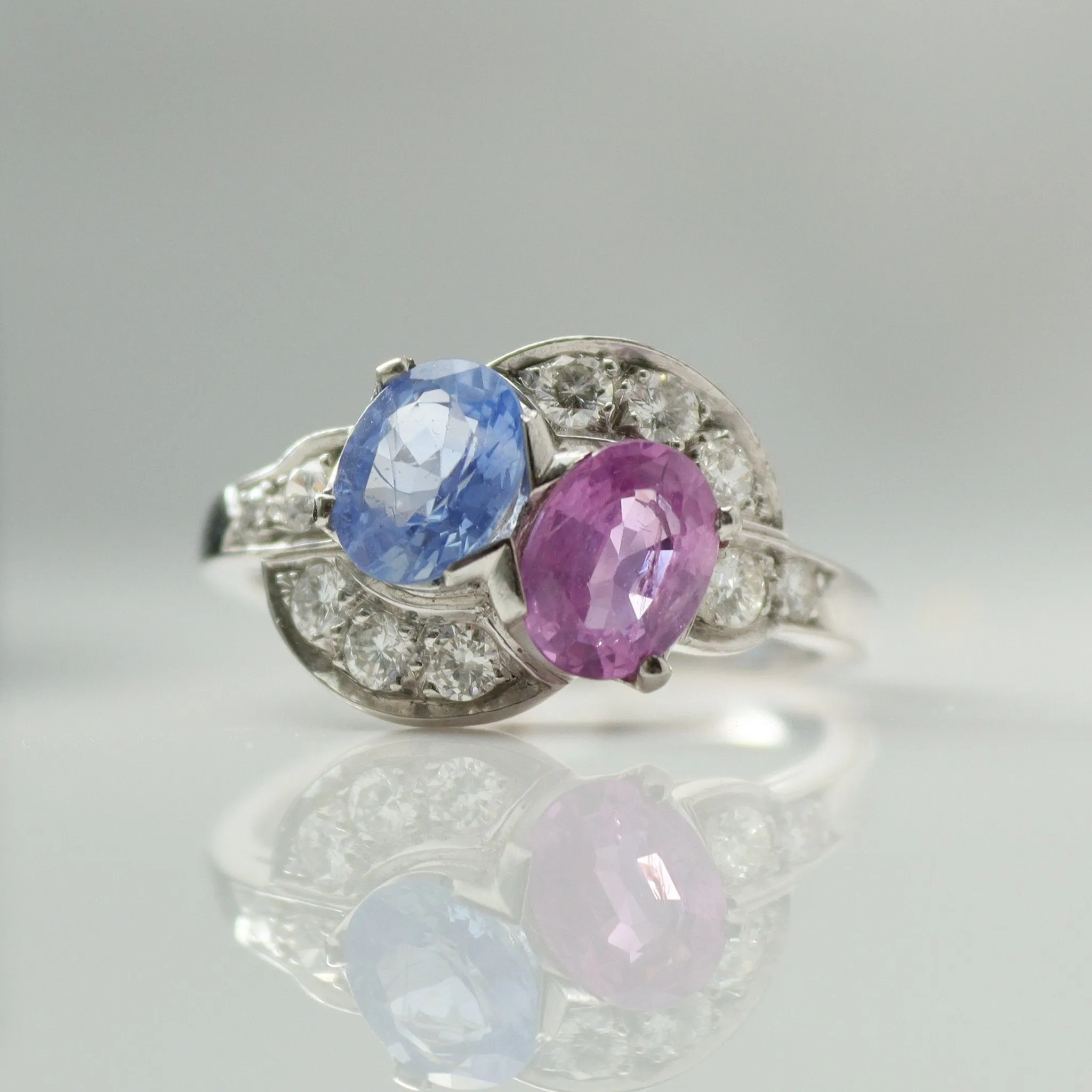 Pink and Blue Sapphire Two Stone Crossover Ring