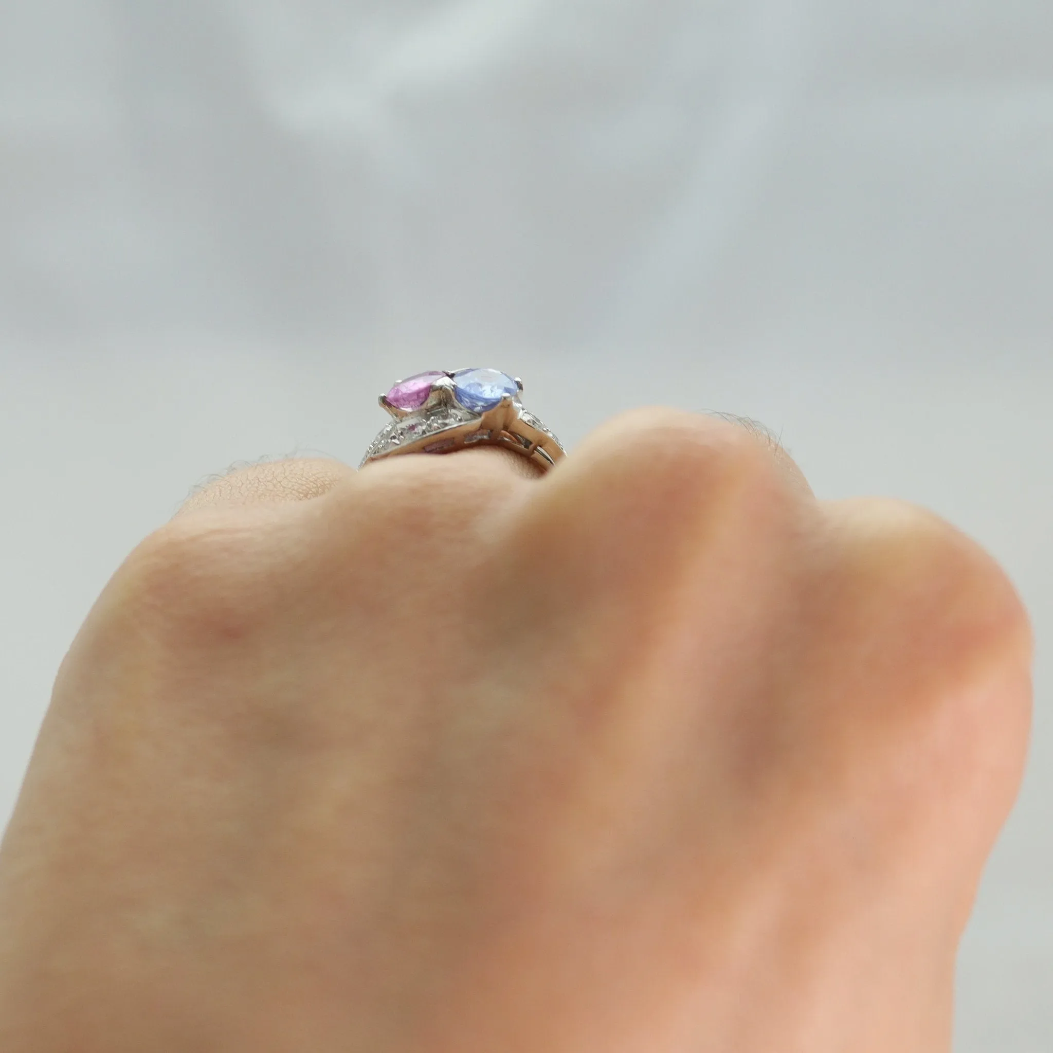 Pink and Blue Sapphire Two Stone Crossover Ring