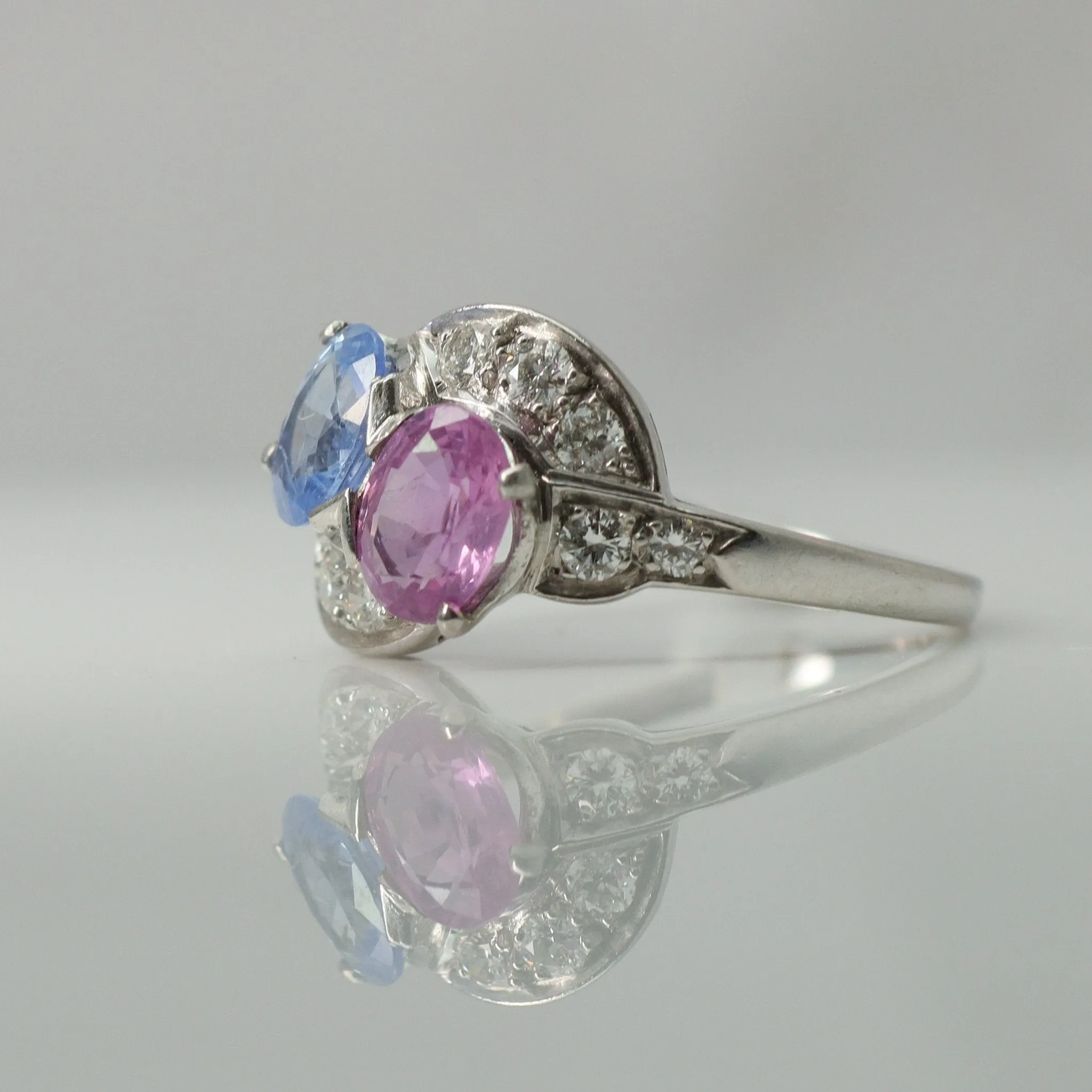 Pink and Blue Sapphire Two Stone Crossover Ring